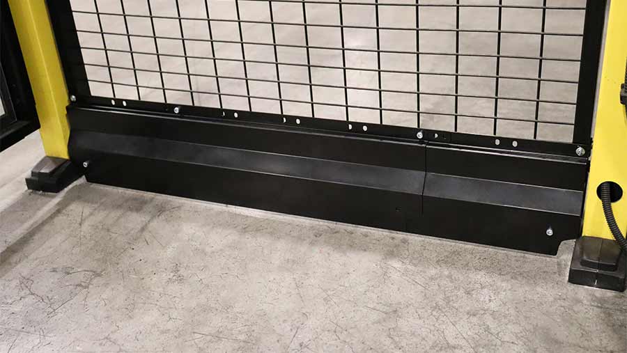 Kick plate for doors mounted on a mesh panel