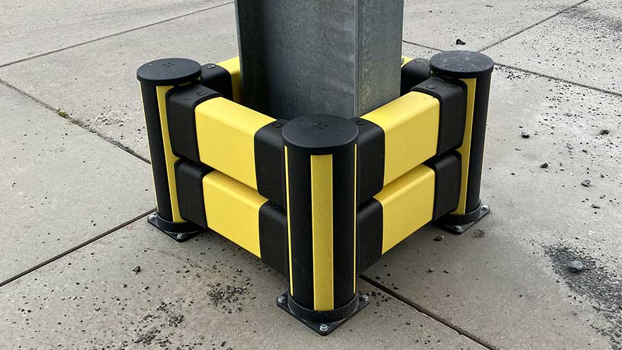 black and yellow impact protection protecting a pillar 
